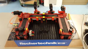 Lego set up Fischertechnik table-top manufacturing testbed